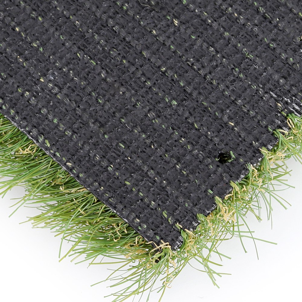 Backing with Drainage Holes - 45mm Artificial Turf - LFL Grass | Artificial Grass Manufacturer & Supplier Backing with drainage holes on 45mm artificial turf, durable backing