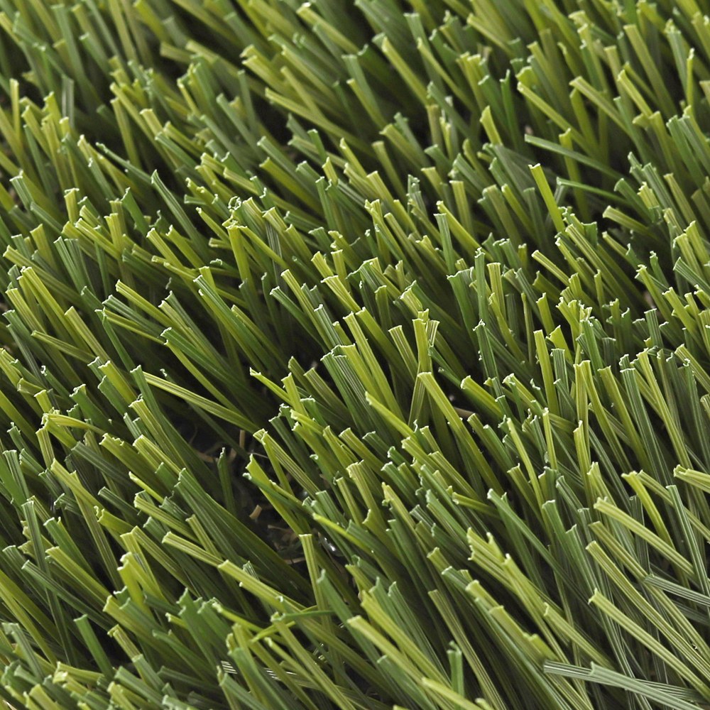 50mm Artificial Grass Blade Macro - LFL - LFL Grass | Artificial Grass Manufacturer & Supplier Macro of 50mm artificial grass blades, natural look and soft texture