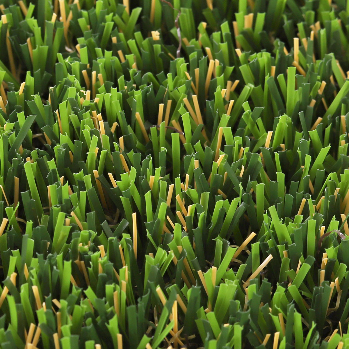 Realistic Artificial Grass Yarn Close-Up - 40mm - LFL Grass | Artificial Grass Manufacturer & Supplier Close-up of realistic 40mm artificial grass yarn and blades