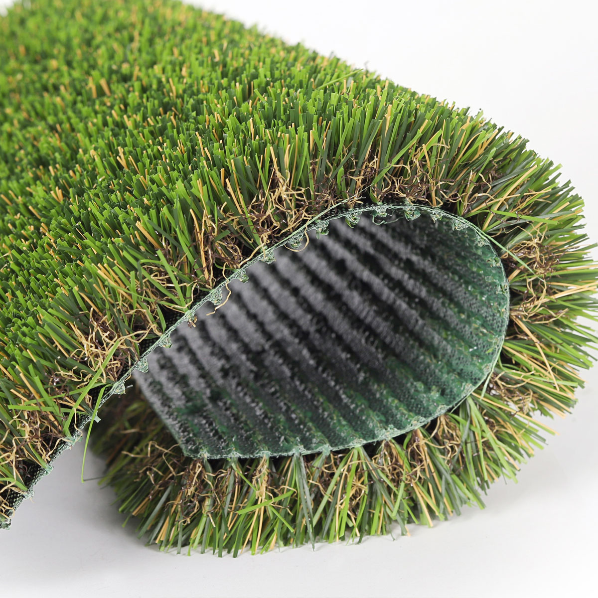 Artificial Grass Roll with Drainage Backing - LFL Grass | Artificial Grass Manufacturer & Supplier Artificial grass roll showing perforated drainage backing