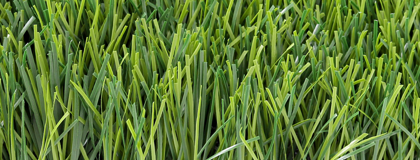 Yiwu-130 - LFL Grass | Artificial Grass Manufacturer & Supplier Artificial grass sourcing samples compared side by side in a Yiwu supplier showroom
